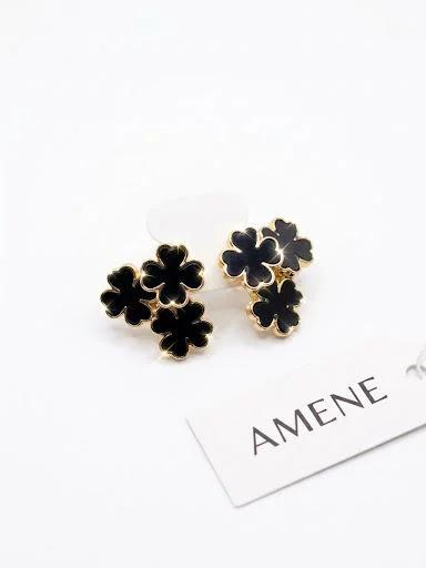 Brinco três trevo dourado e preto 1,5 cm